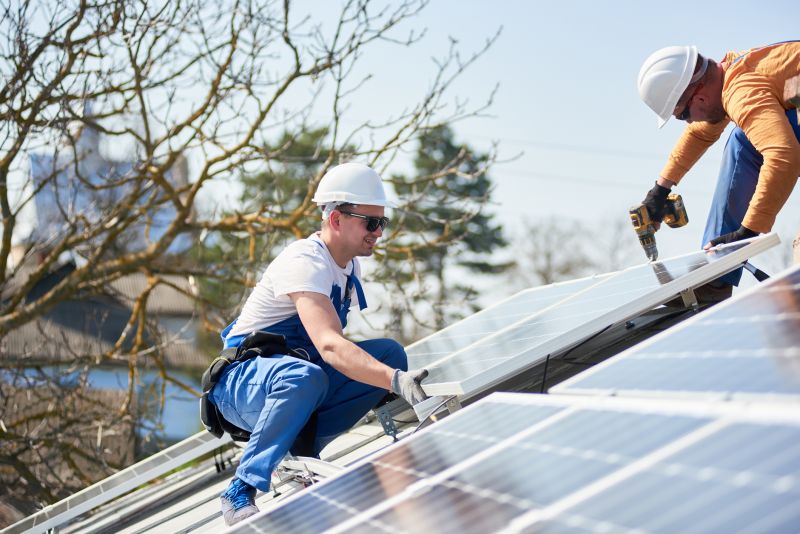 Service Technician Inspecting Panels